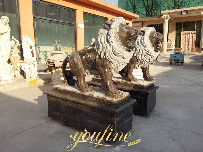 pair of standing black lion statues 1