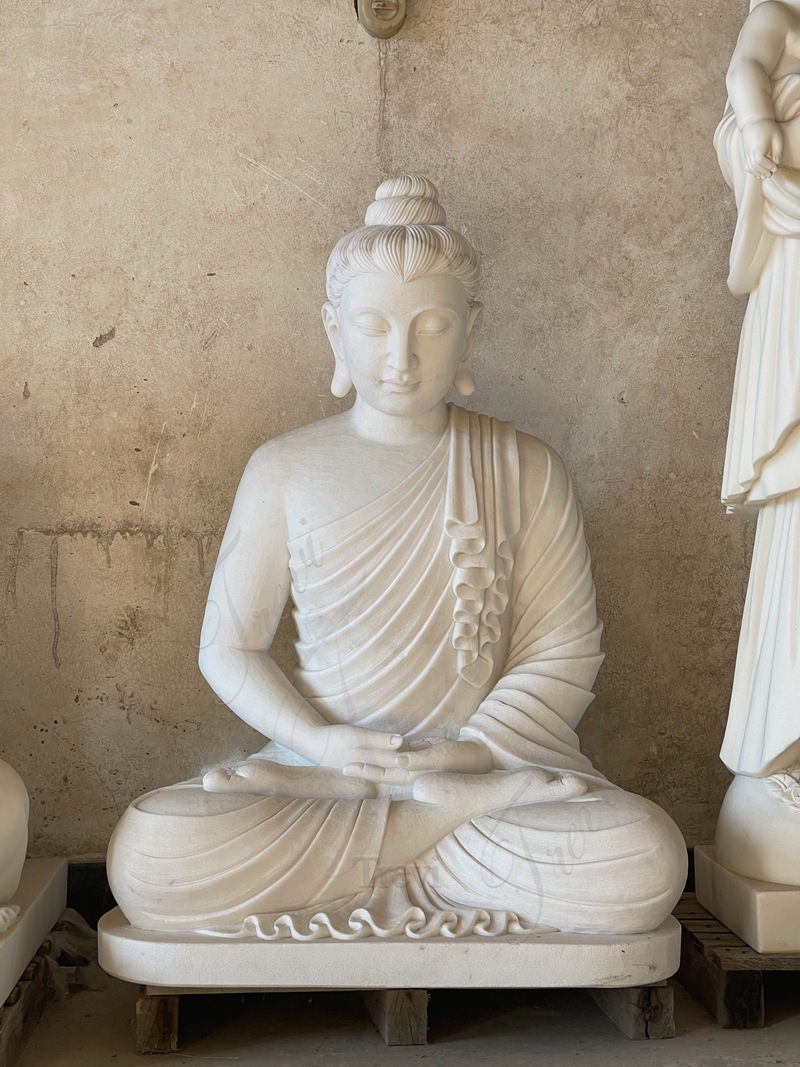 pure white marble buddha statue