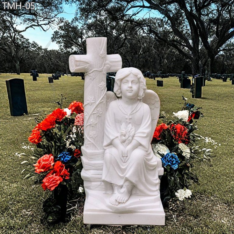 white marble cherub headstone