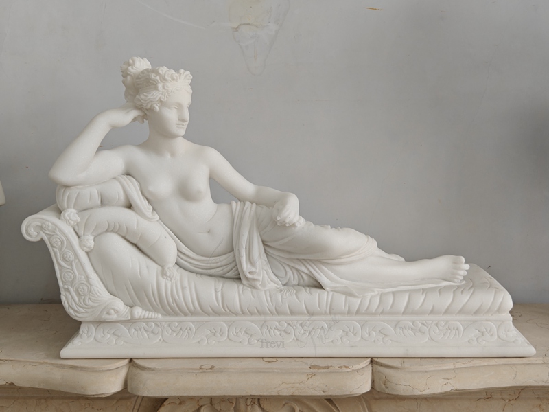 elegant marble woman lying down sculpture