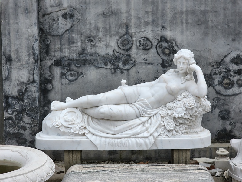 elegant marble lady lying down statue