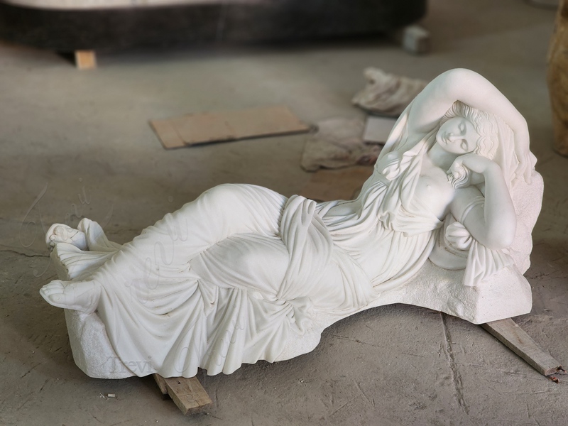 marble woman lying down statue