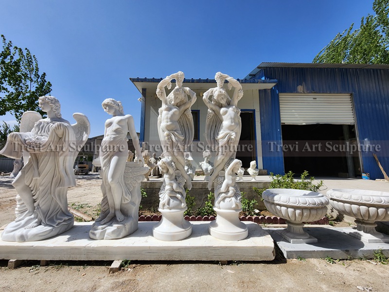 marble woman statue with flower