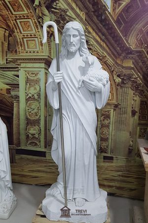 jesus holding sheep statue